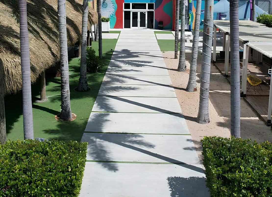 The walkway up to the building door, at ground level